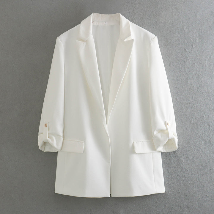 Elegant blazer jacket for women with structured sleeves and discreet golden accents Lune London