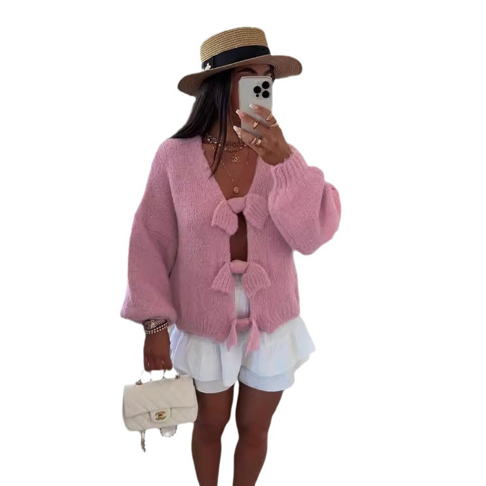 Fashionable knitted jacket for women with playful knots Lune London