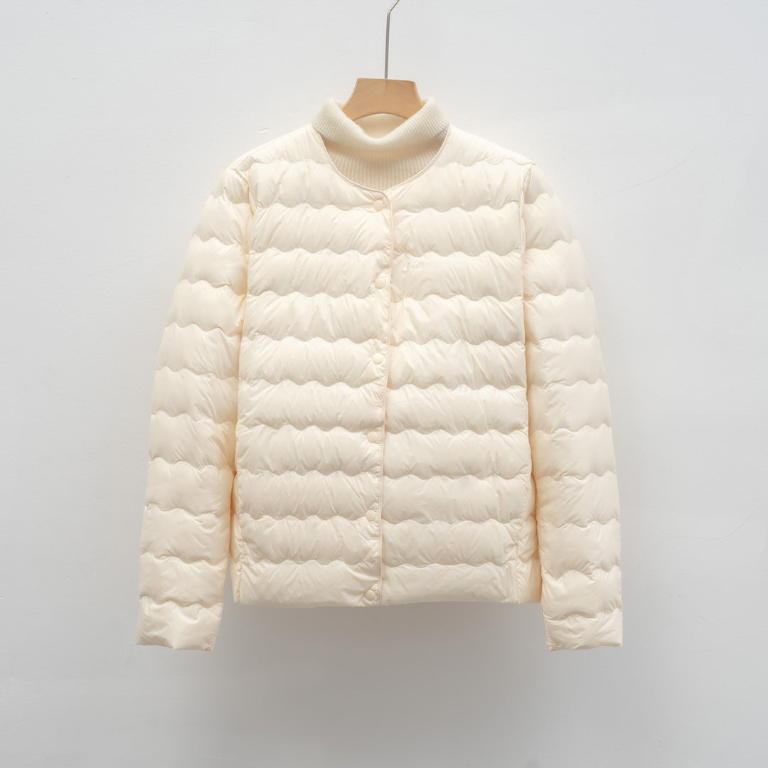Ladies lightweight quilted jacket with high collar and elastic cuffs Lune London
