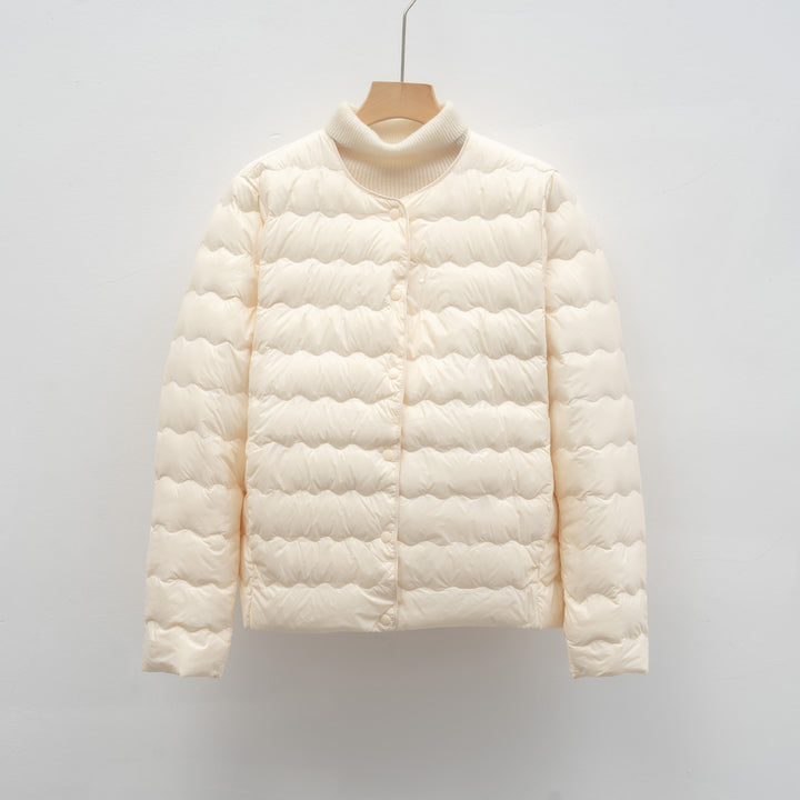 Ladies lightweight quilted jacket with high collar and elastic cuffs Lune London