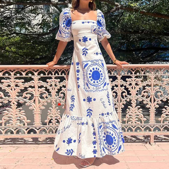 Robe maxi femme avec manches bouffantes et détails imprimés floraux Chic & Stil