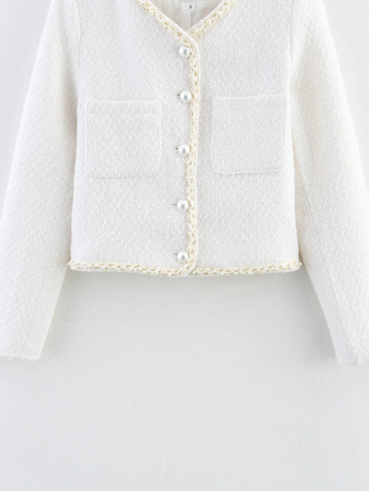 Elegant short-sleeve women's jacket with pearl-adorned buttons and patch pockets Lune London