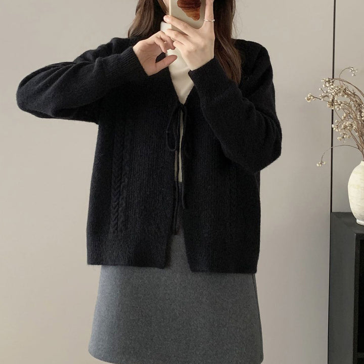 Women’s knit jacket with cable pattern and decorative drawstring Lune London