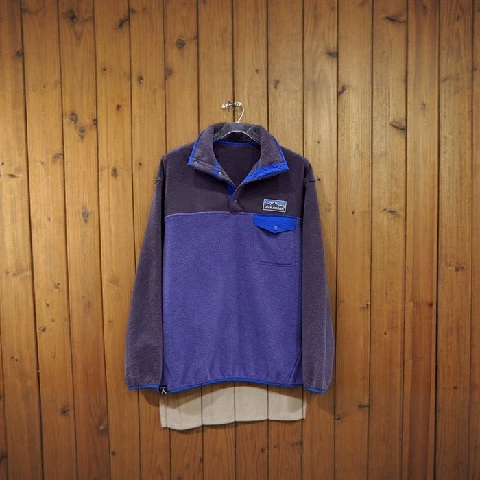 Pull en polaire pour femmes avec col haut et poches pratiques Chic & Stil