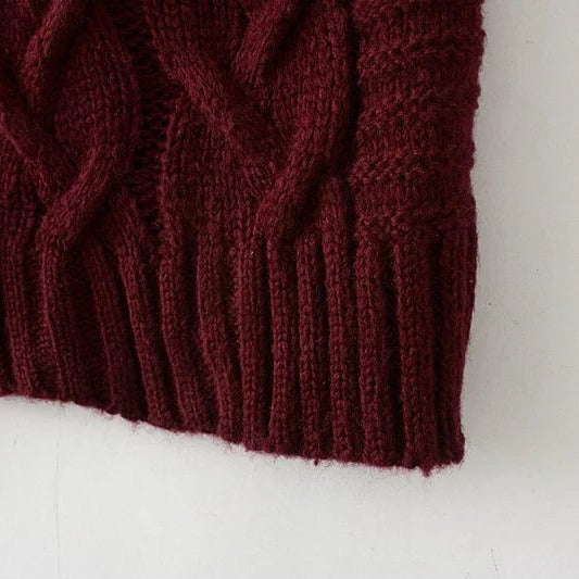 Women chunky knit cardigan with deep pockets and braided pattern Lune London