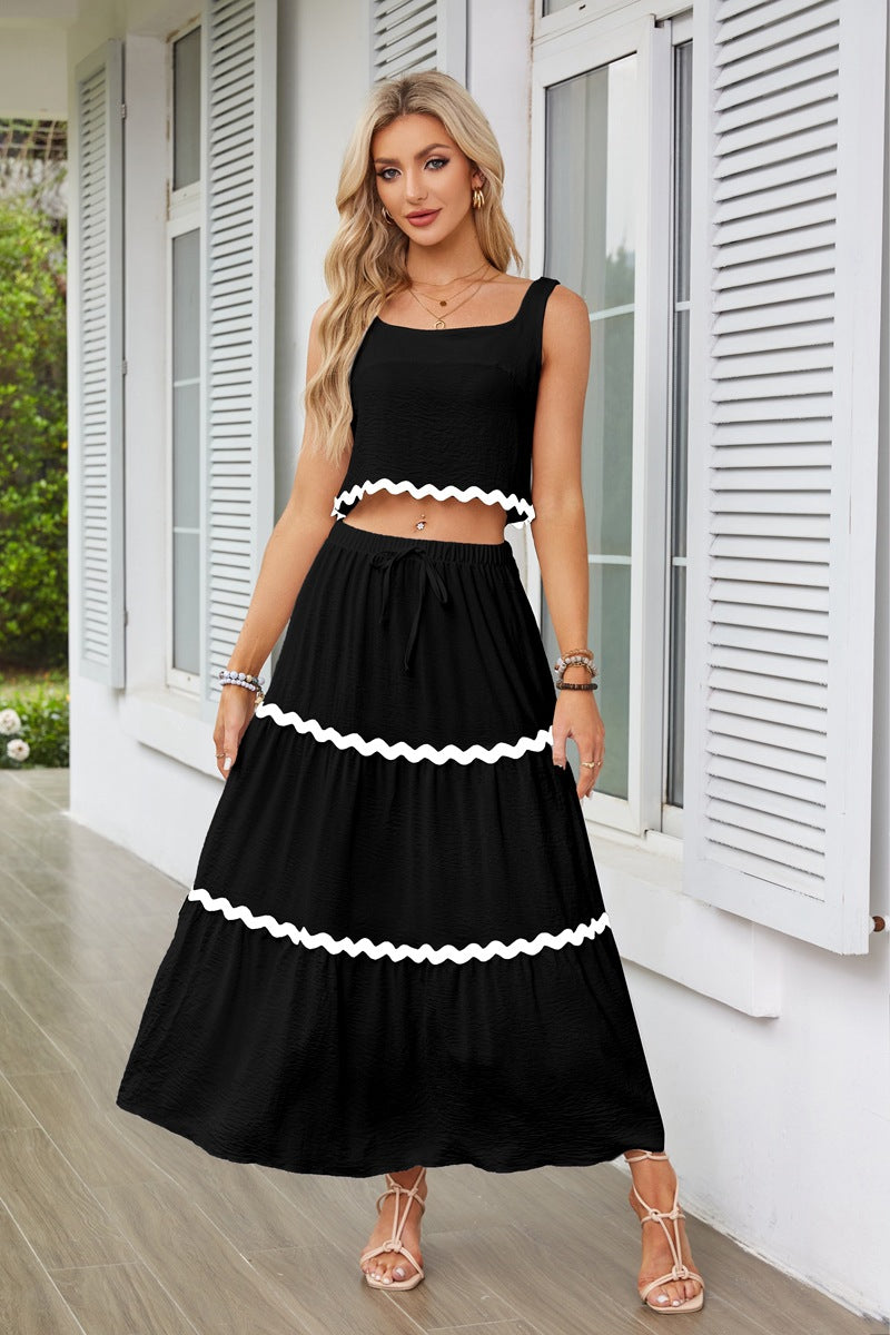 Two-piece women's set with crop top and lace maxi skirt Lune London