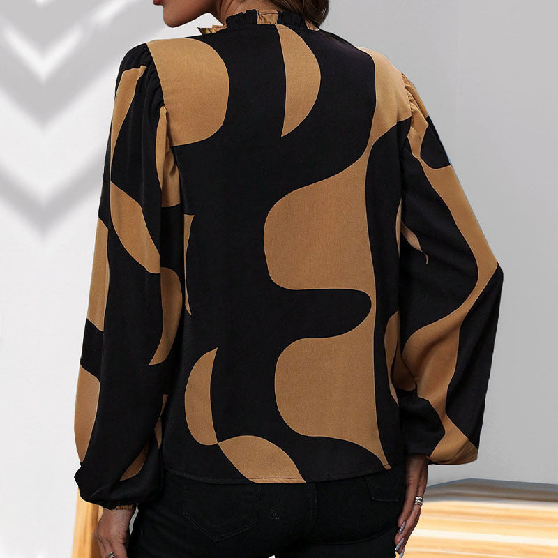 Trendy women's blouse with geometric print and voluminous sleeves Lune London