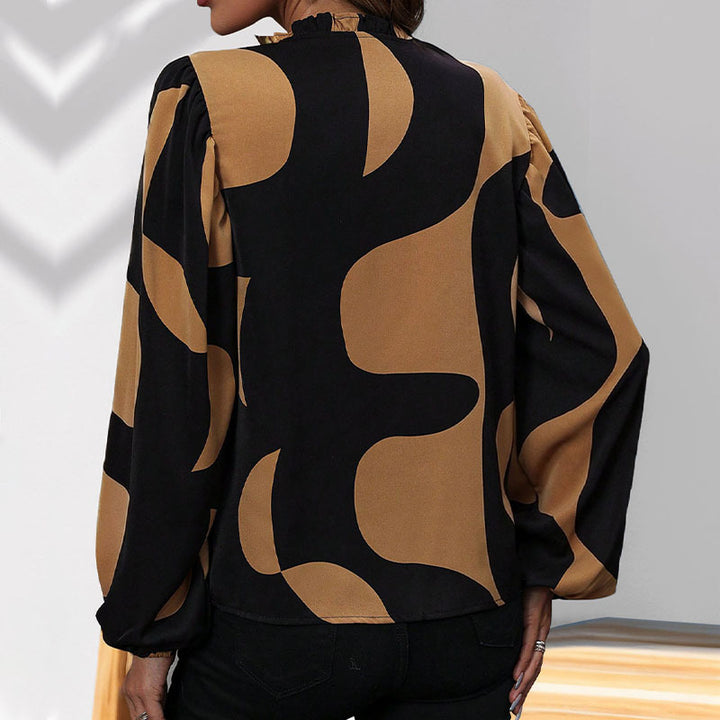 Trendy women's blouse with geometric print and voluminous sleeves Lune London
