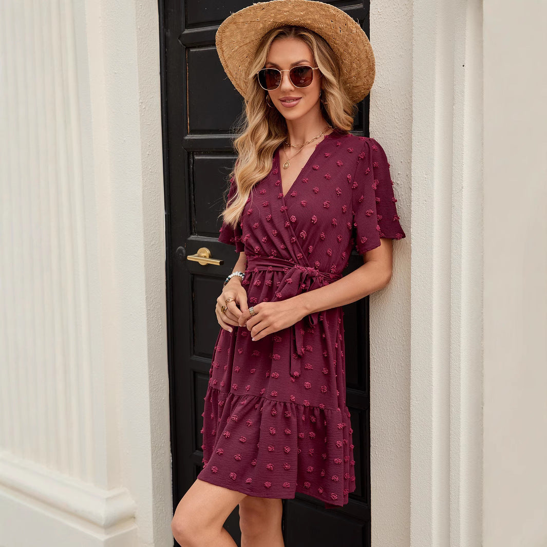V neck wrap dress for women with a belt at the waist and textured fabric Lune London