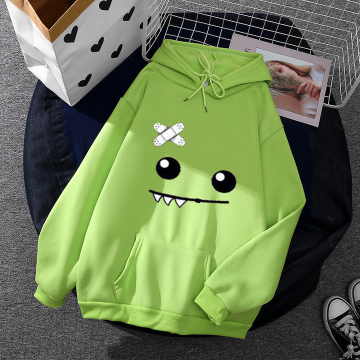 Women's hoodie with playful monster design Chic & Stil