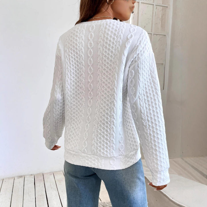 Knitted sweater for women with structured surface texture and elegant round neckline Lune London