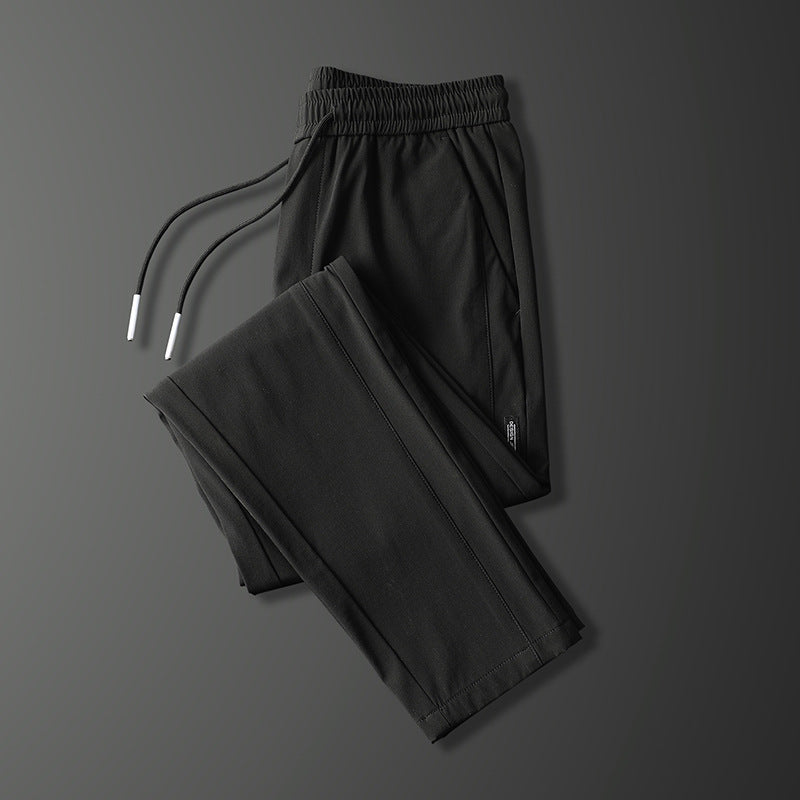 Men's sports pants with adjustable drawstring and zippered pockets on the sides Lune London