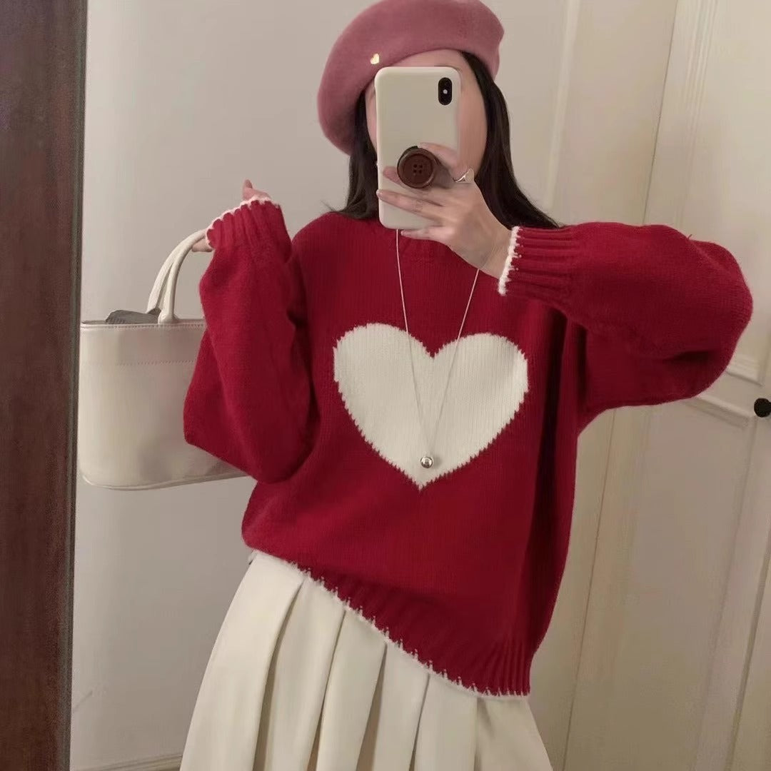 Trendy women's sweater with heart pattern and relaxed fit Lune London