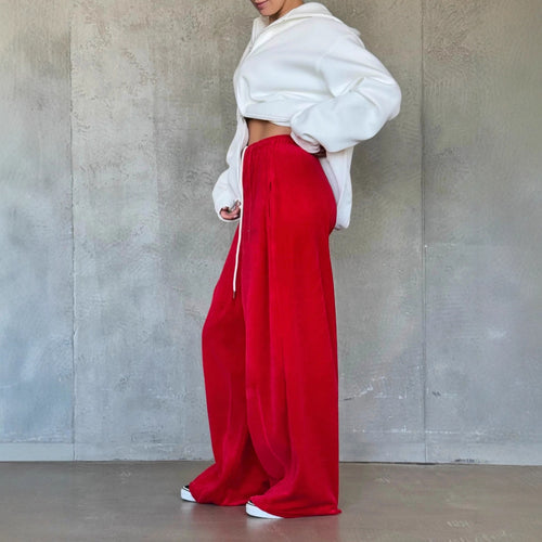 Wide velvet pants for women with elastic waist and practical side pockets Lune London