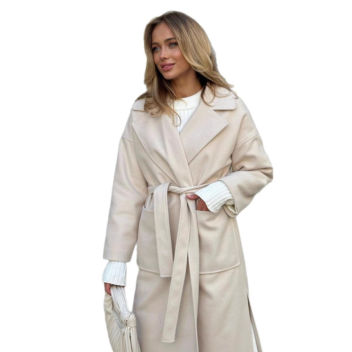 Elegant transitional coat for women with wide lapels and belt detail Lune London