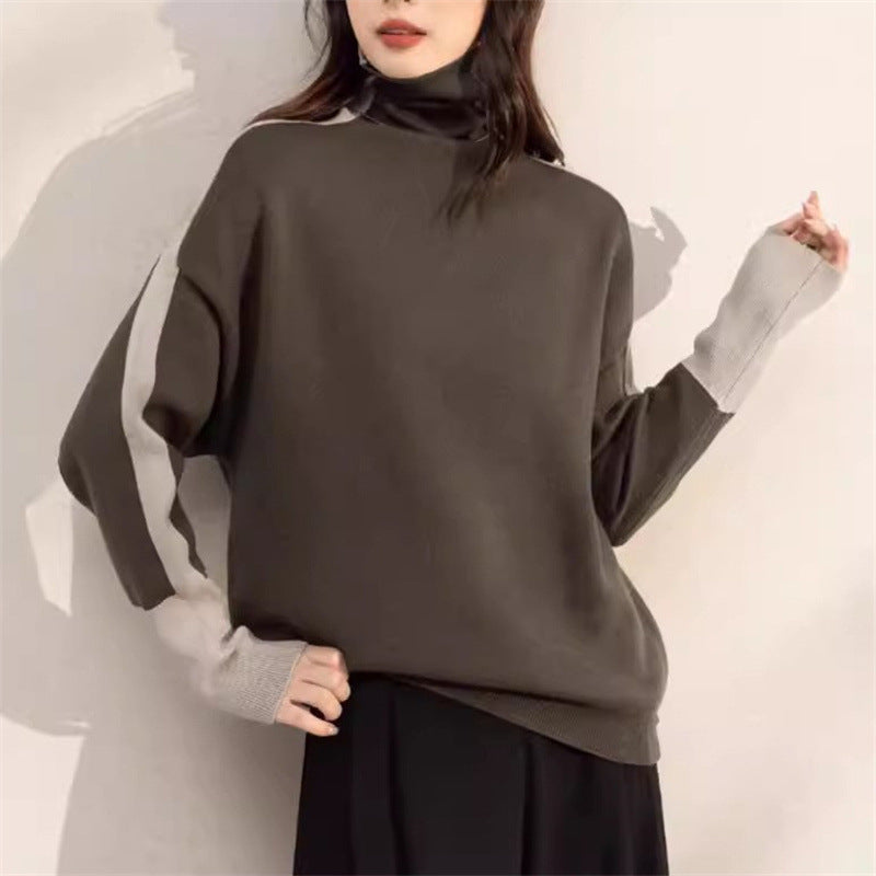 Sweatshirt oversized pour femmes avec col montant moderne et accents de manches contrastants Chic & Stil