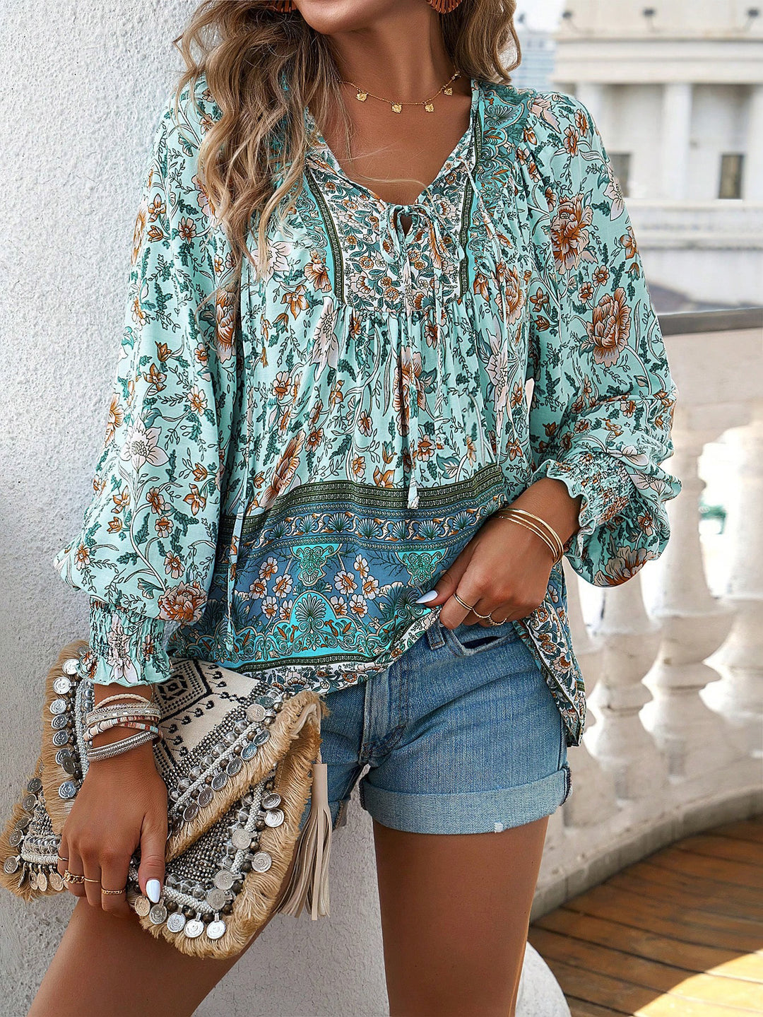 Blouse for women with floral patterns and tie neckline Lune London