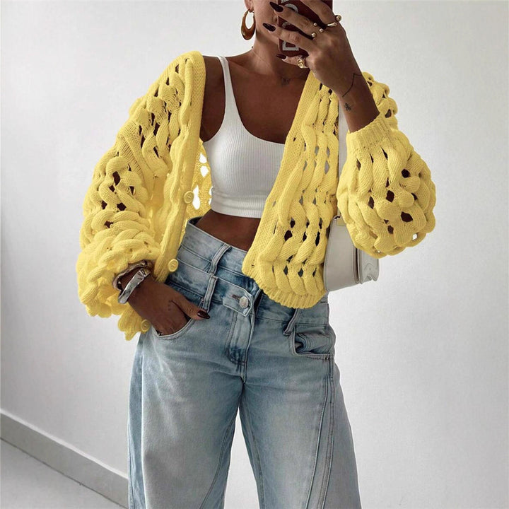 Women's knitted sweater with a unique hole pattern and a casual fit Lune London