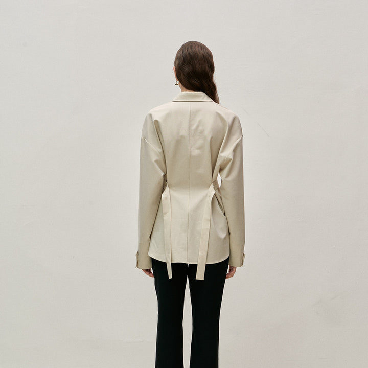 Trendy women's blouse with asymmetric cut and elegant waist Lune London