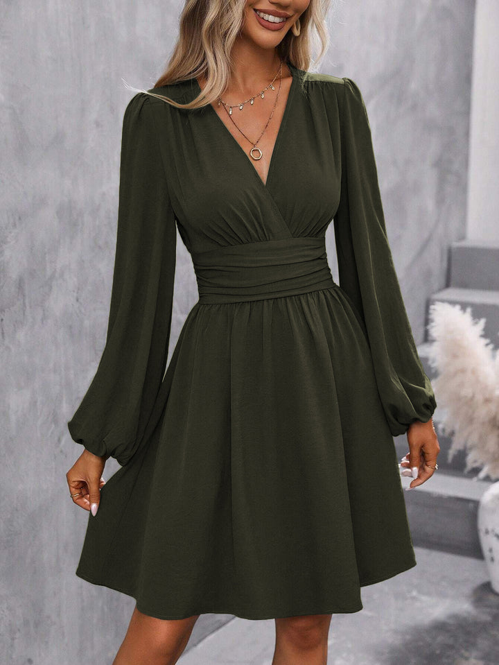 Modern wrap dress for ladies with casual puff sleeves and a waist belt Lune London