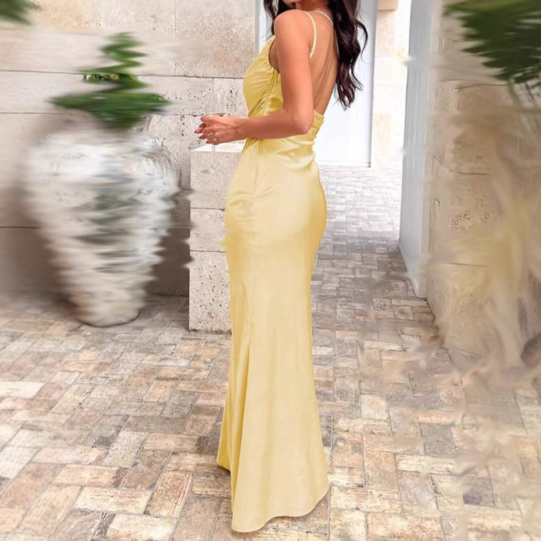 Elegant satin maxi dress for women with asymmetrical strap and refined ruffle details Lune London