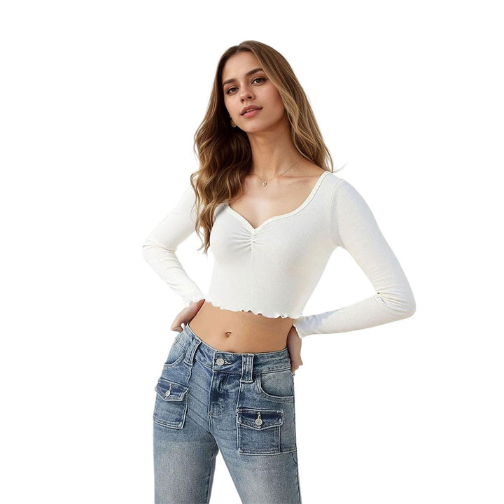 Short long-sleeve blouse for women with playful gathered hem Chic & Stil