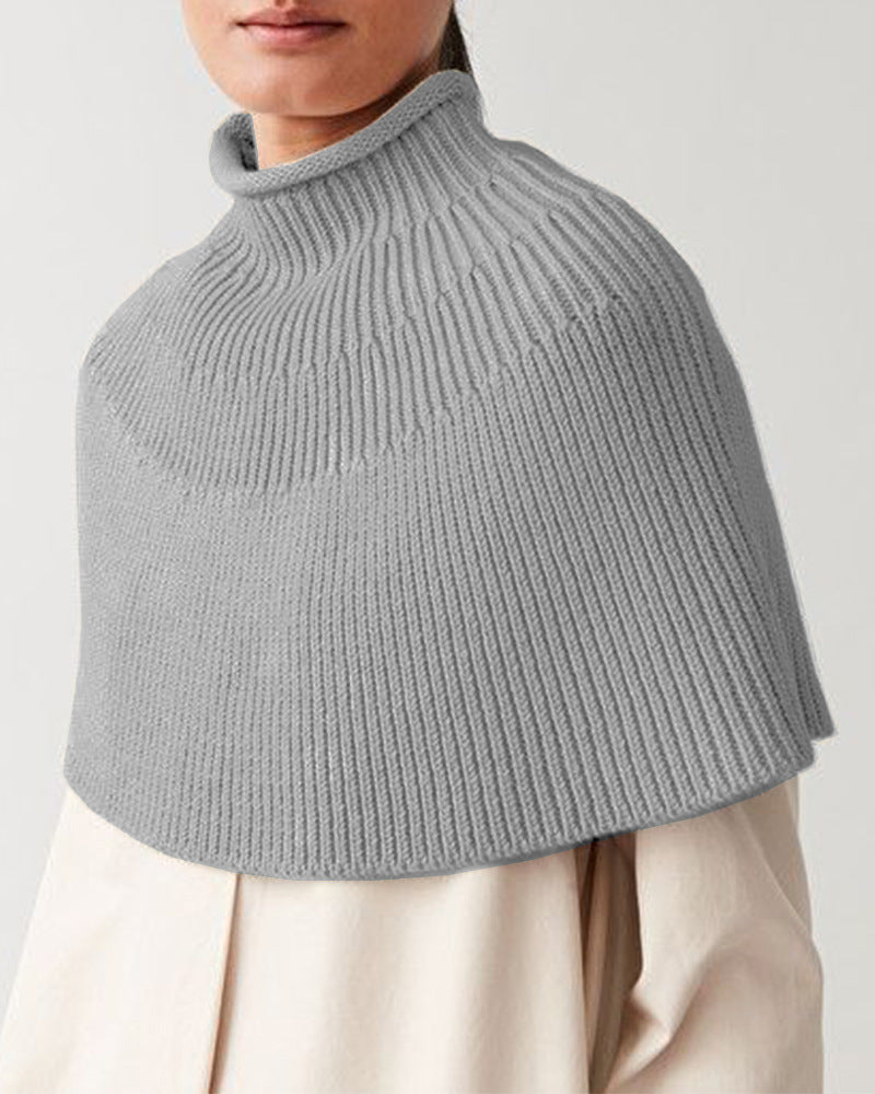 Knitted cape for women with high collar and fine rib structure Lune London