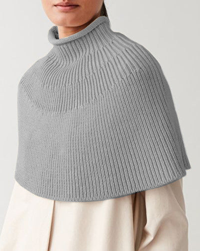 Knitted cape for women with high collar and fine rib structure Lune London