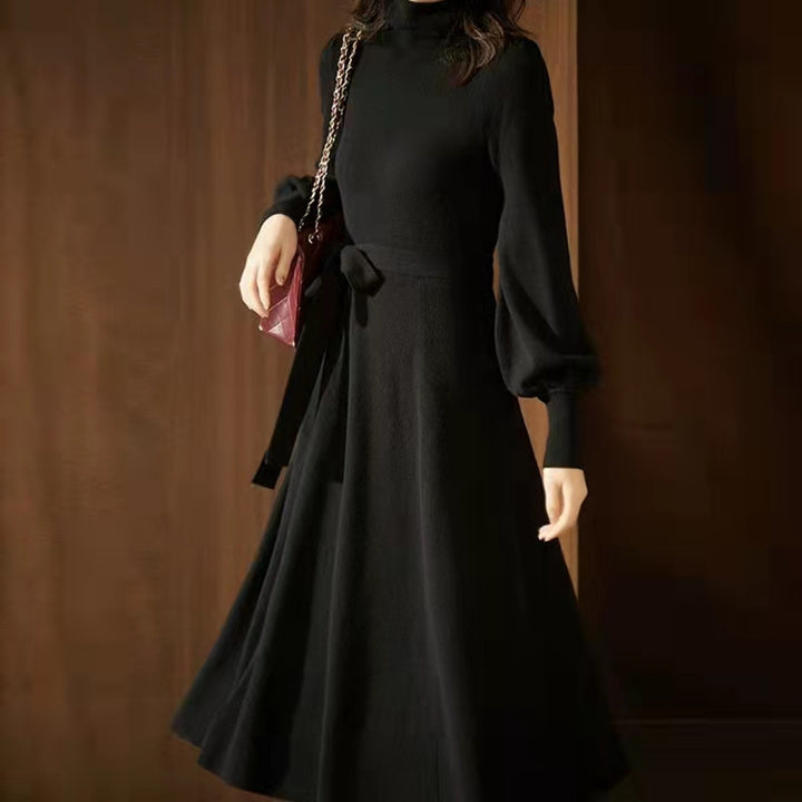 Knitted dress for women with high collar and belt at the waist Lune London