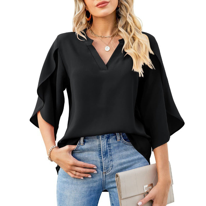 Comfortable women's blouse with wide sleeves and a V-neck Lune London