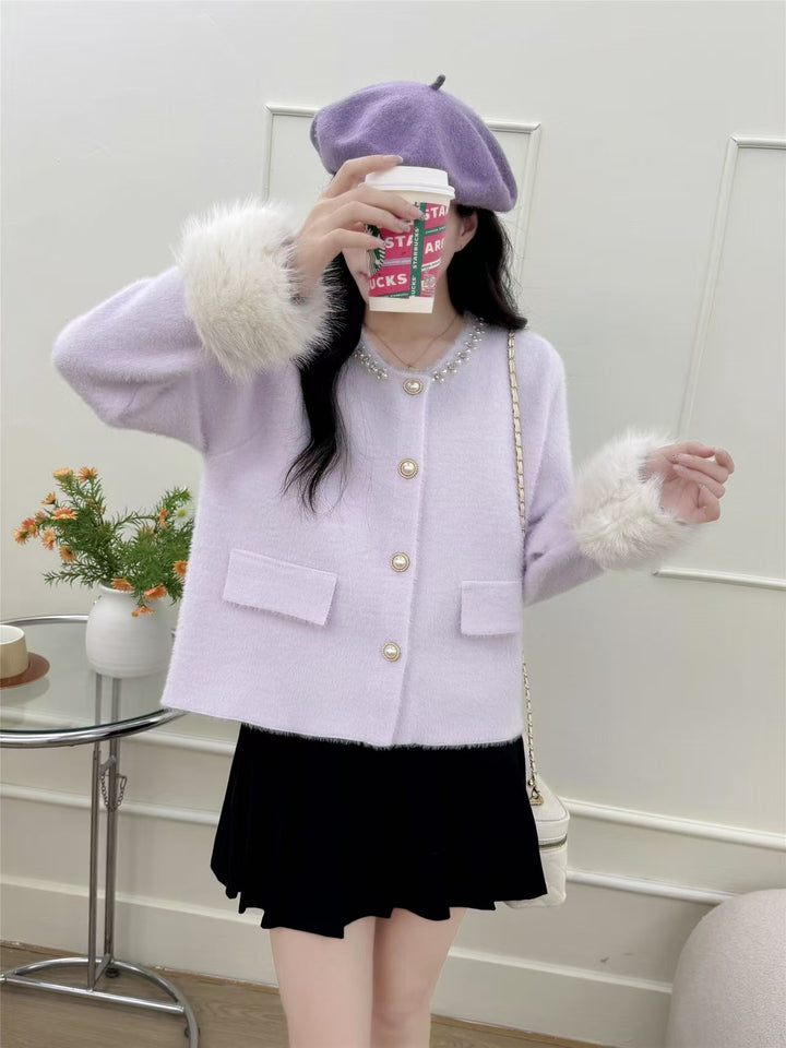 Cardigan élégant pour femmes avec décoration de perles et manches duveteuses Chic & Stil