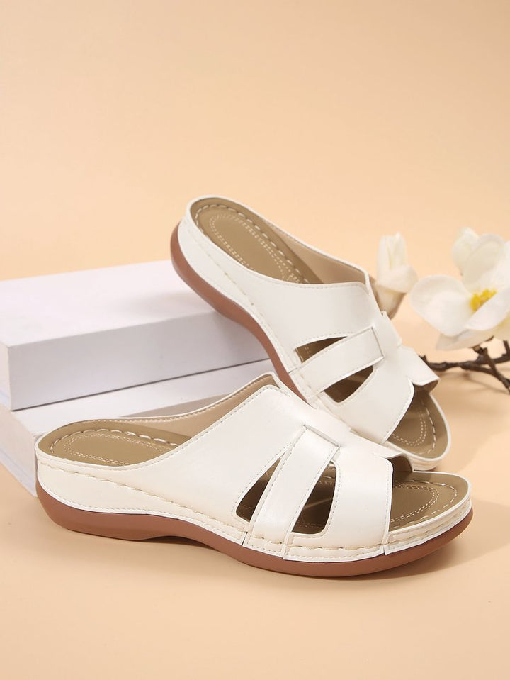 Comfortable slippers for ladies with ergonomic sole and trendy bands Lune London