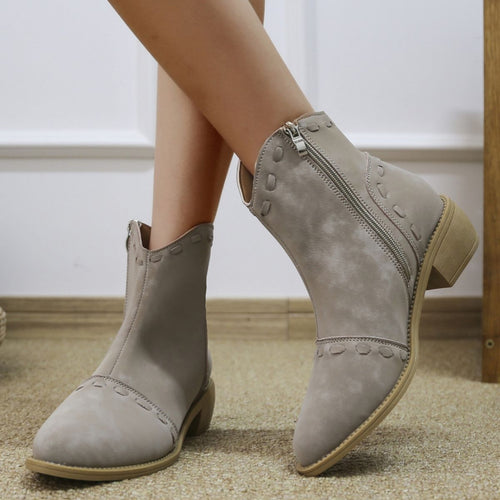 Elegant ankle boots for women with trendy decorative stitching and a practical zipper Lune London