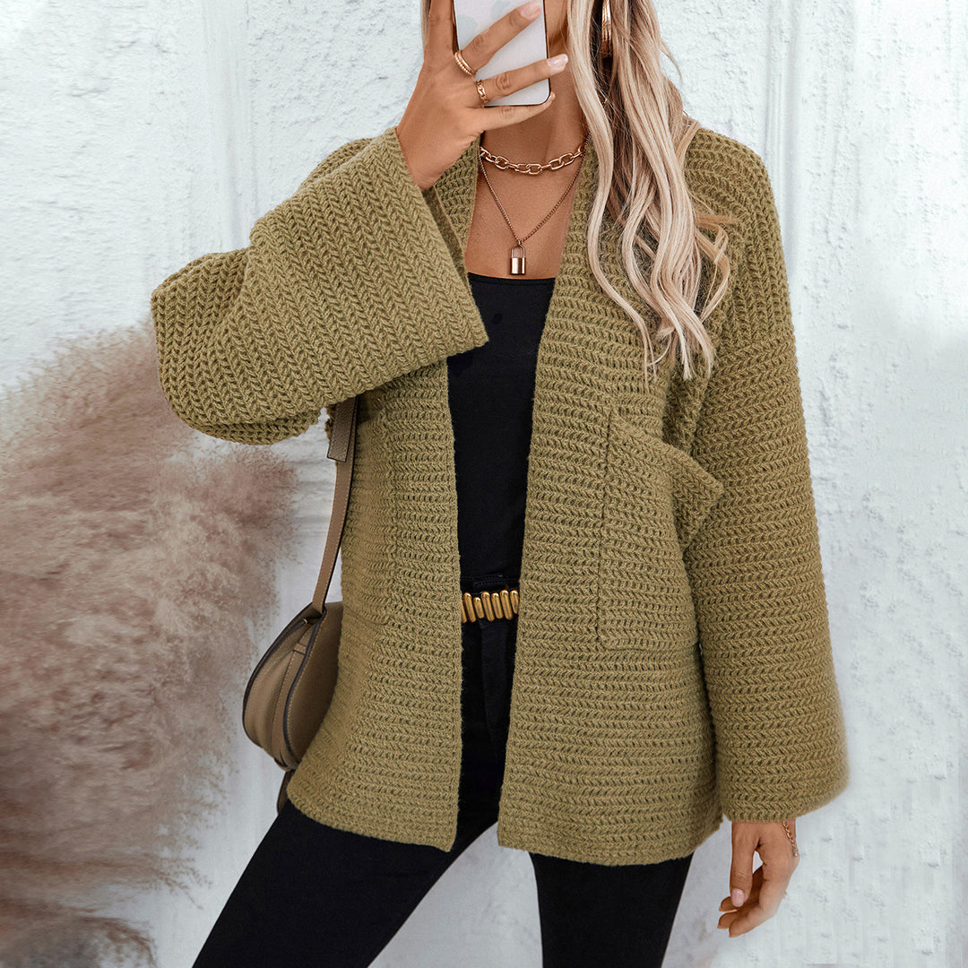 Airy knitted jacket for women with large pockets and open sleeves Lune London