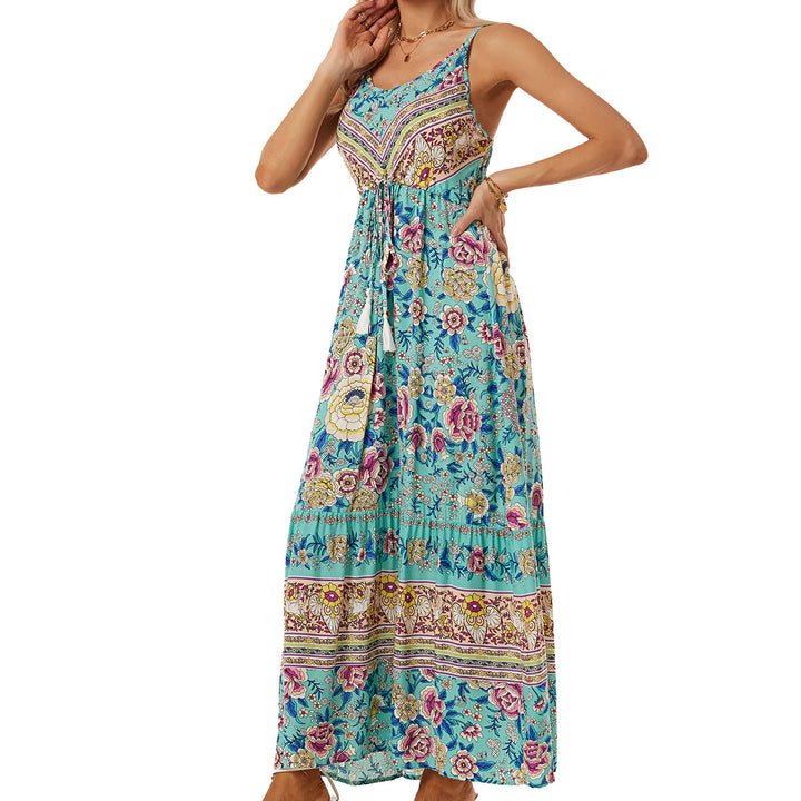 Airy maxi dress for women with a playful floral design and a drawstring at the waist Lune London