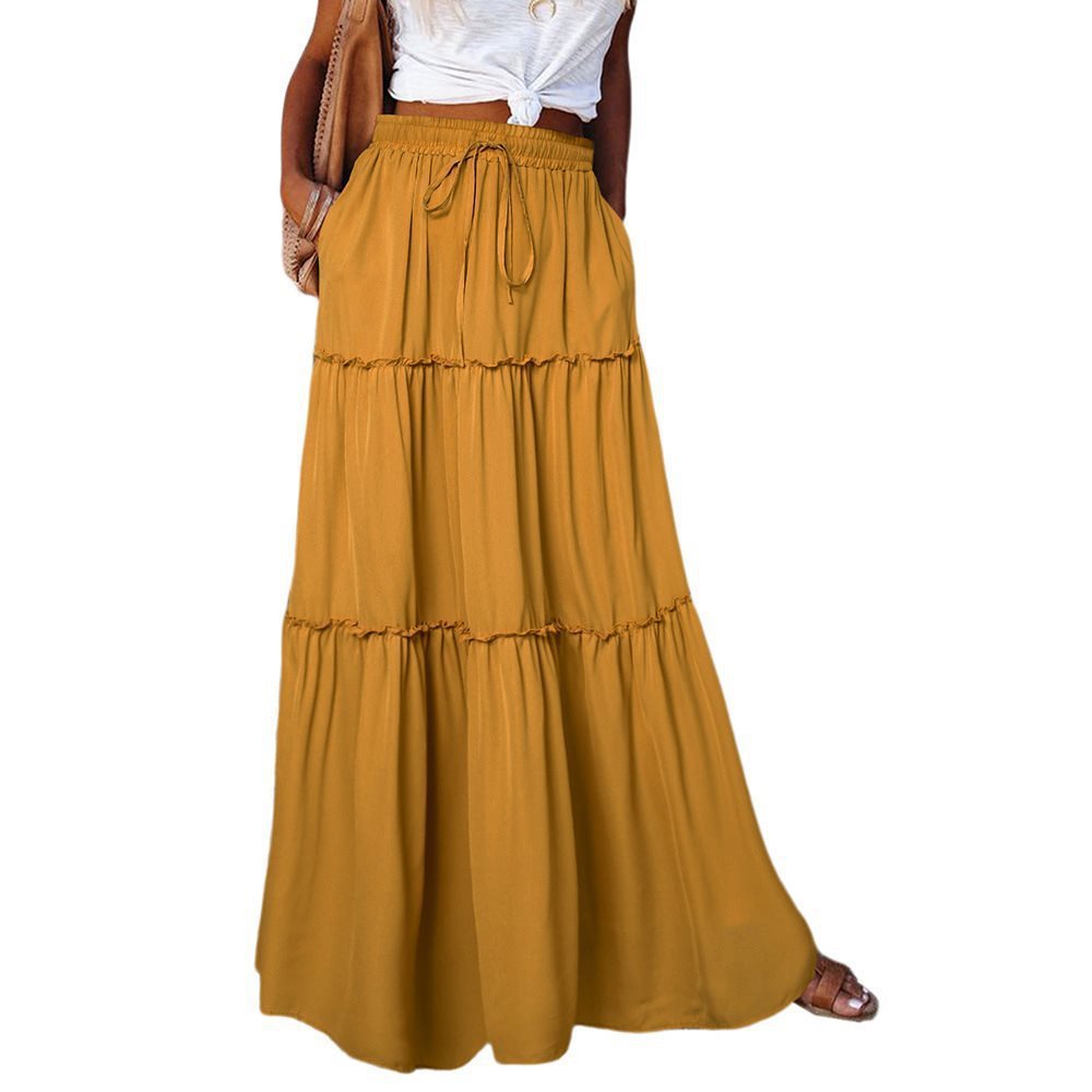 Long and flowing skirt for women with an elastic waistband and practical pockets Lune London