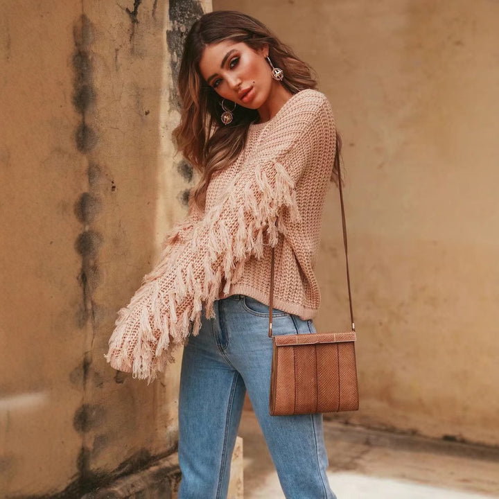 Trendy knitted pullover for women with fringed sleeves and a unique textured pattern Lune London
