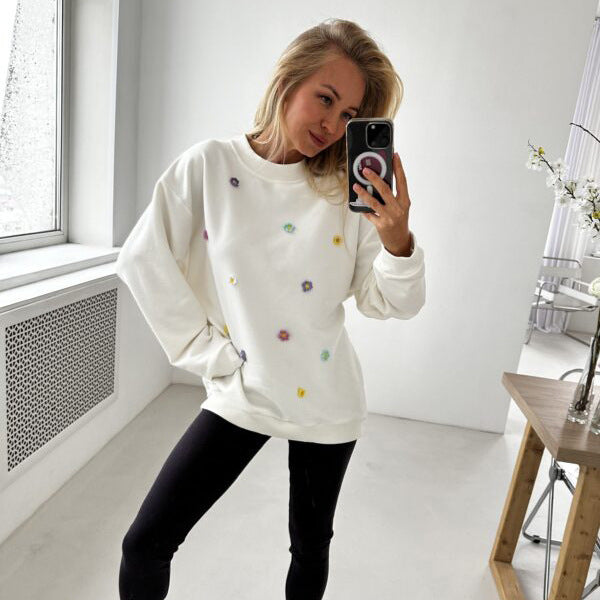 Women comfortable sweatshirt with colorful floral applications Lune London