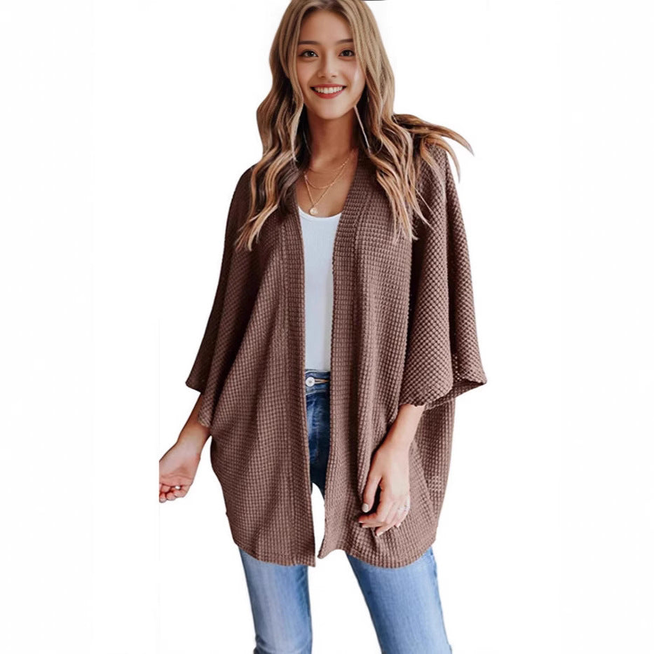 Ladies casual knit kimono with a loose fit and chic casual design
