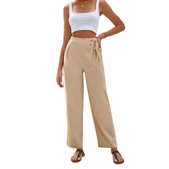 Loose summer pants for women with elastic waistband and tie belt Lune London