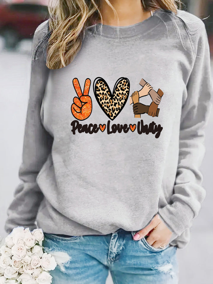 Sweatshirt pour femmes avec un design créatif Paix, Amour & Unité Chic & Stil