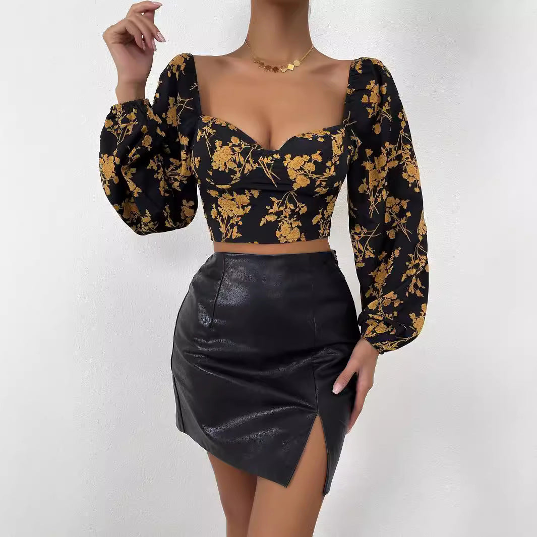 Short women's top with floral pattern and elegant puff sleeves Chic & Stil
