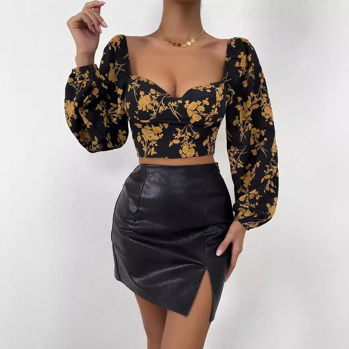Short women's top with floral pattern and elegant puff sleeves Chic & Stil