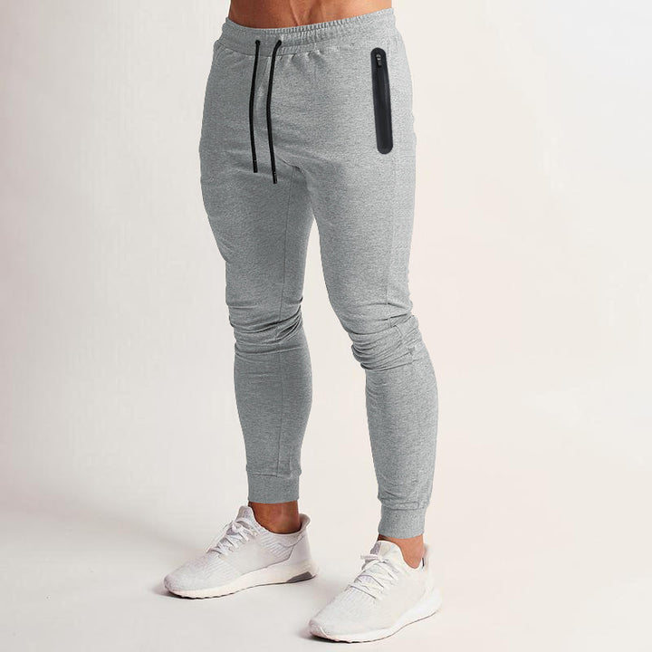 Fitted men's training pants with side zipper Lune London