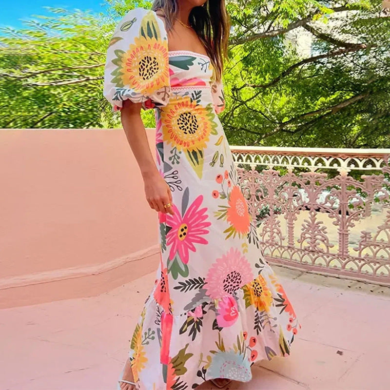 Robe maxi femme avec manches bouffantes et détails imprimés floraux Chic & Stil