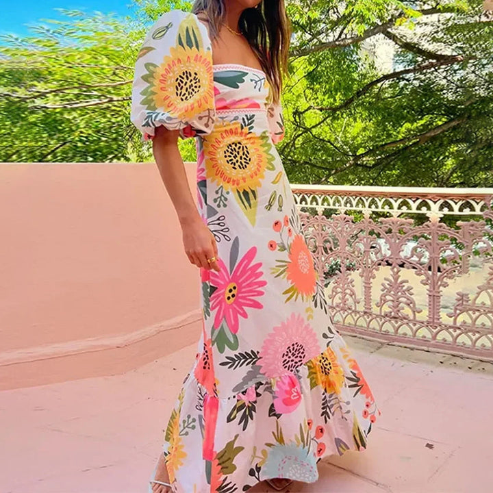 Robe maxi femme avec manches bouffantes et détails imprimés floraux Chic & Stil