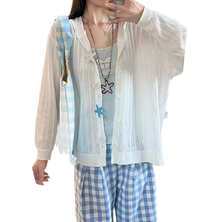Knitted jacket for women with an airy lace pattern and practical pockets Lune London