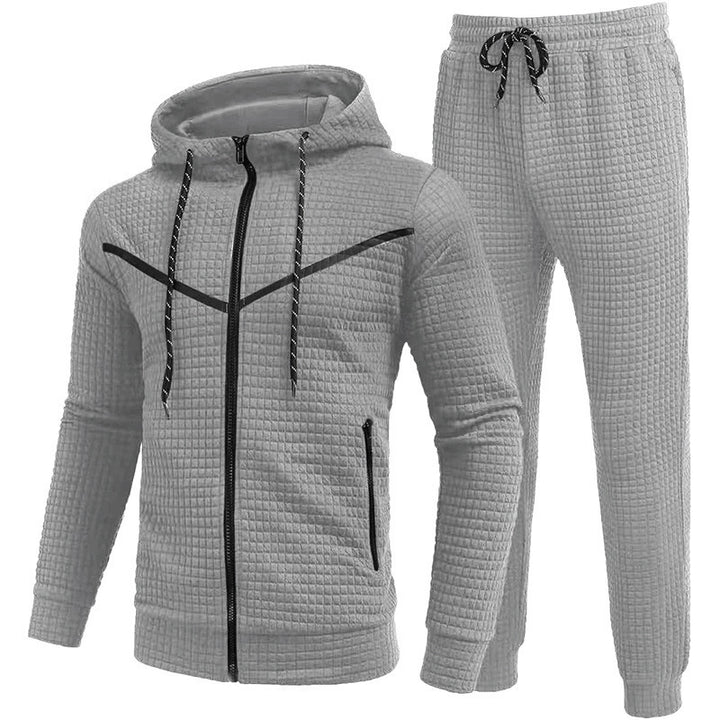 Urban tracksuit jacket for men with practical zippered pockets and structured surface Lune London