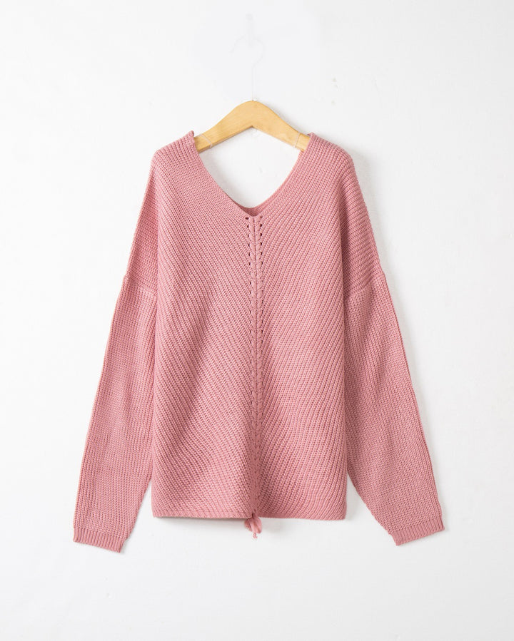 Women's thick knit sweater with an attractive V-neckline and practical drawstring details Lune London