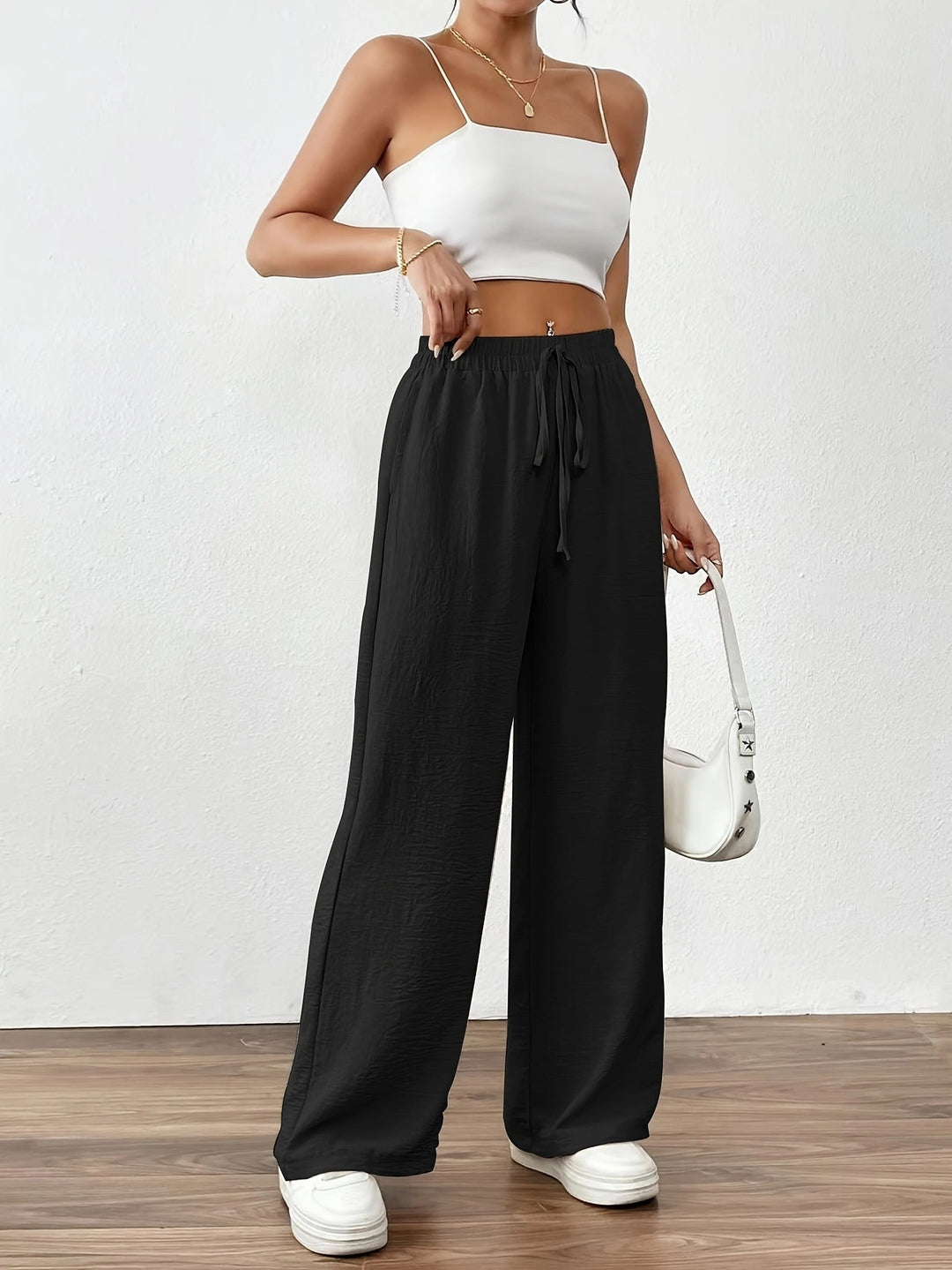 Pantalons larges en chiffon pour femmes avec taille élastique et cordon de serrage Chic & Stil